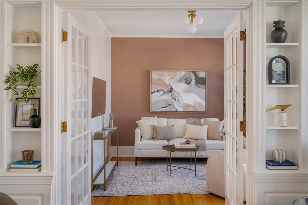 182 Maplewood Street, Unit 2 Watertown, MA 02472 - Photo 6 of 42 a living room with furniture and a potted plant