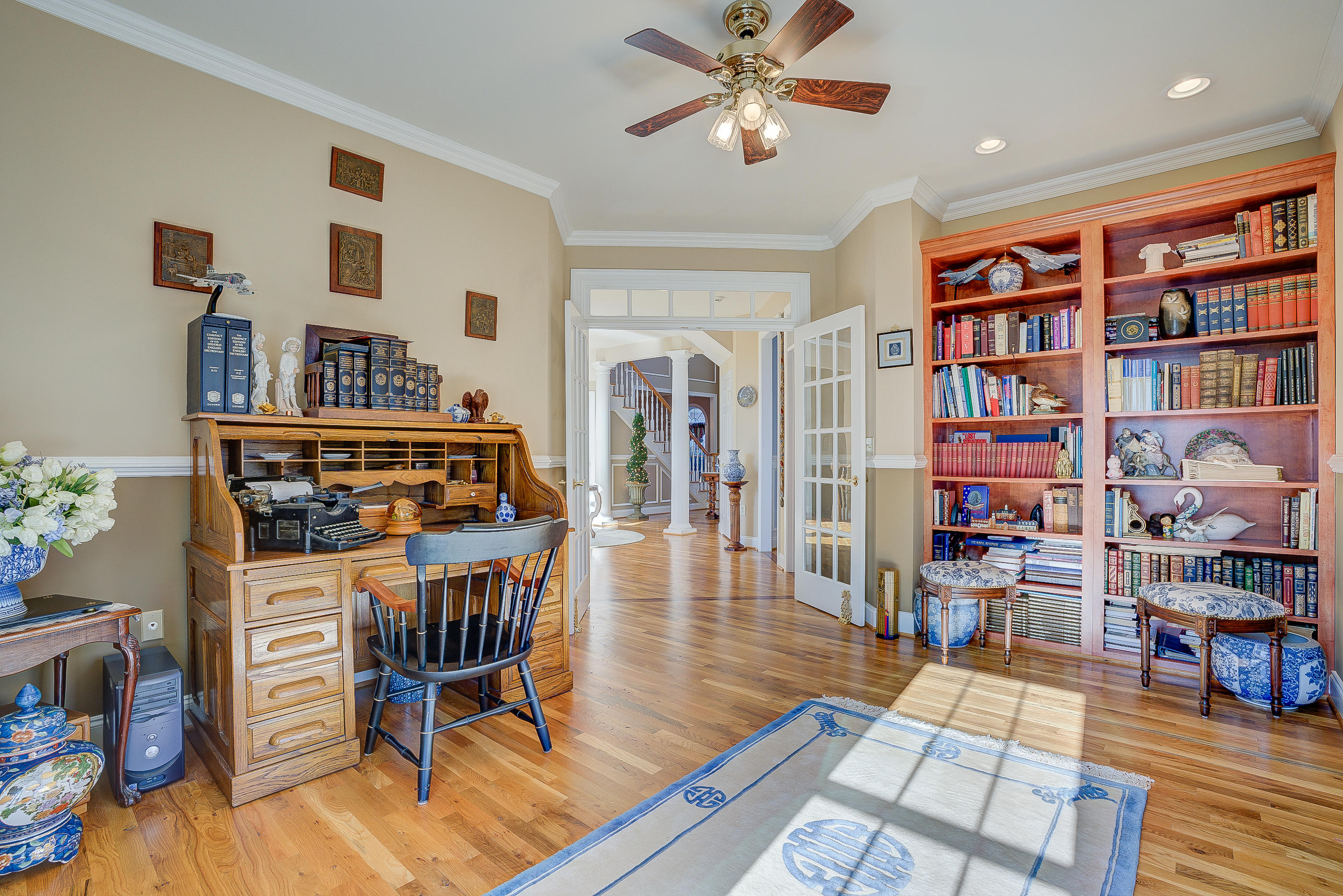 124 Massey Road Stuart, VA 24171 - Photo 17 of 42 a living room with lots of furniture and a book shelf