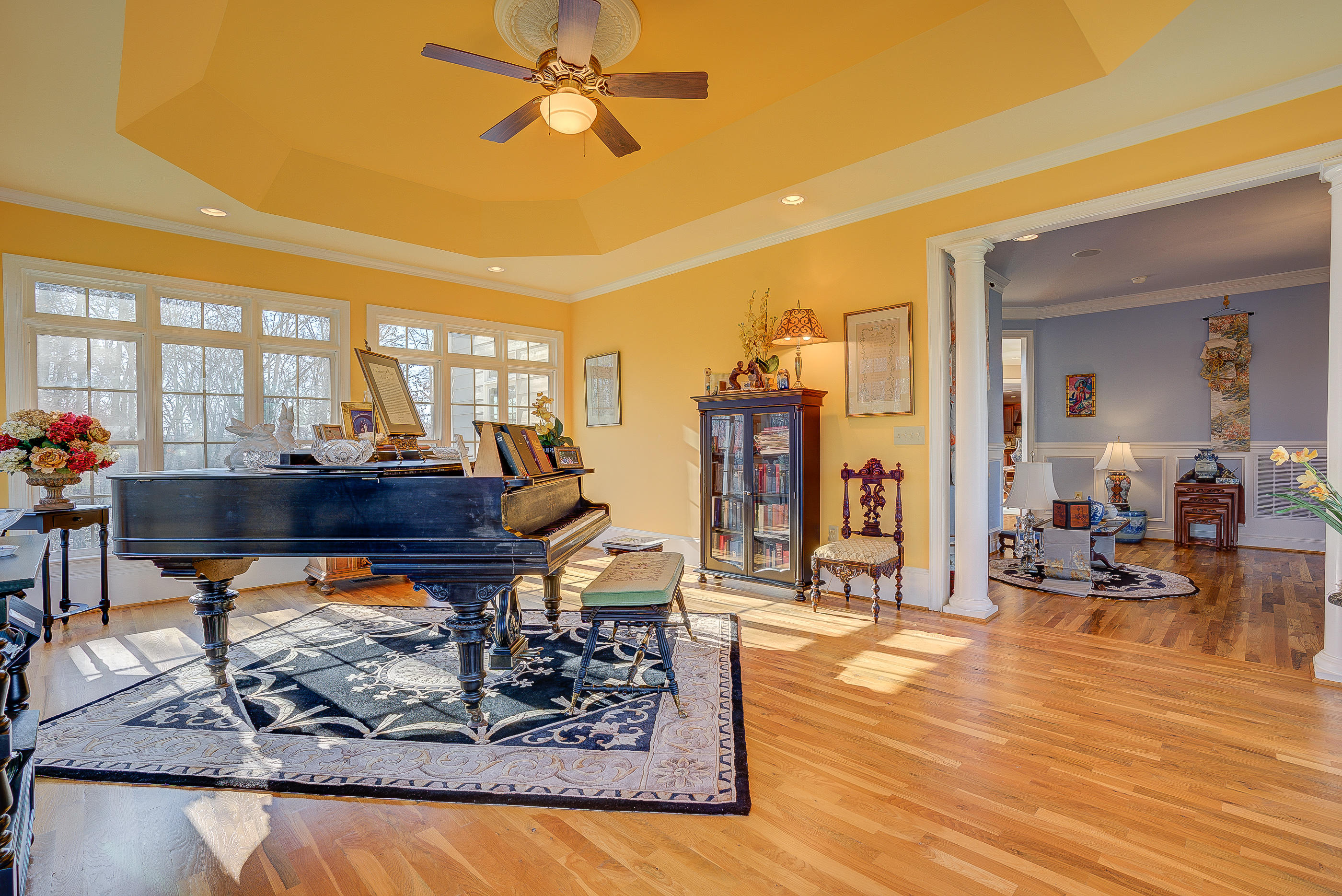 124 Massey Road Stuart, VA 24171 - Photo 19 of 42 a living room with furniture a dining table and a piano table with wooden floor