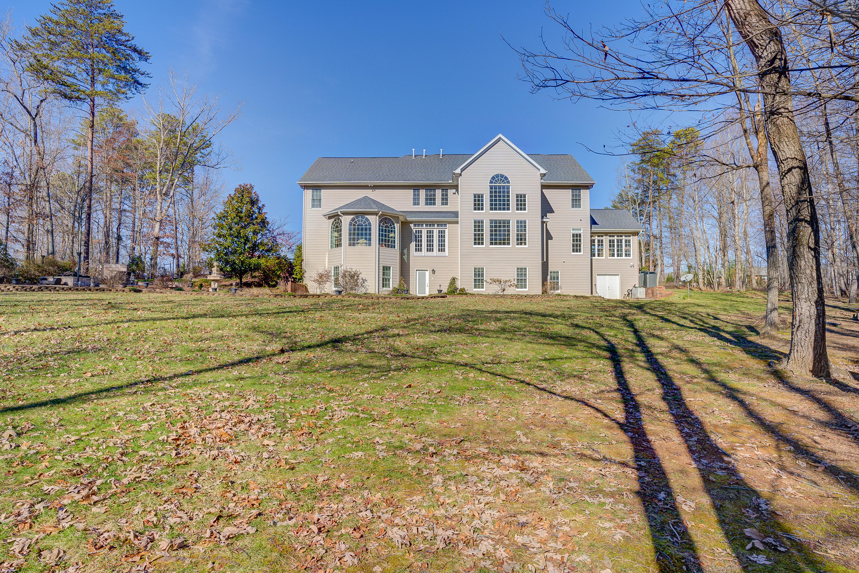 124 Massey Road Stuart, VA 24171 - Photo 4 of 42 a front view of a house with a yard