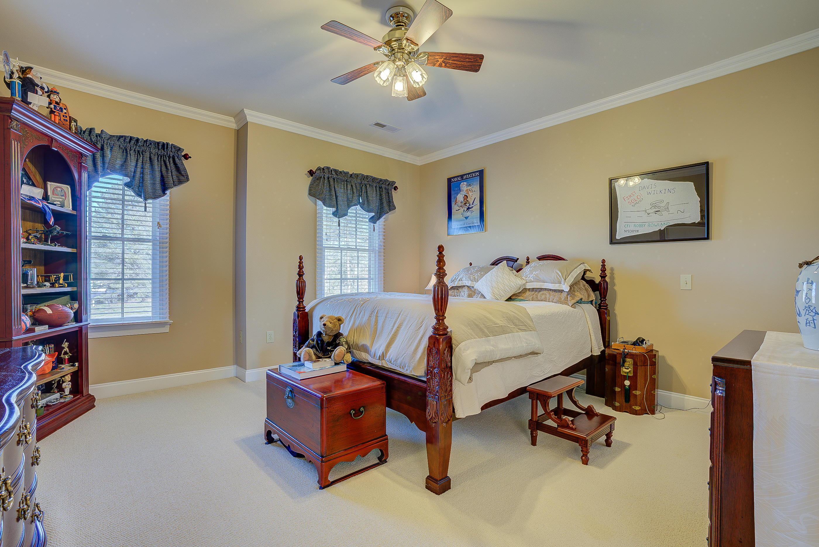 124 Massey Road Stuart, VA 24171 - Photo 32 of 42 a bedroom with furniture and a chandelier fan