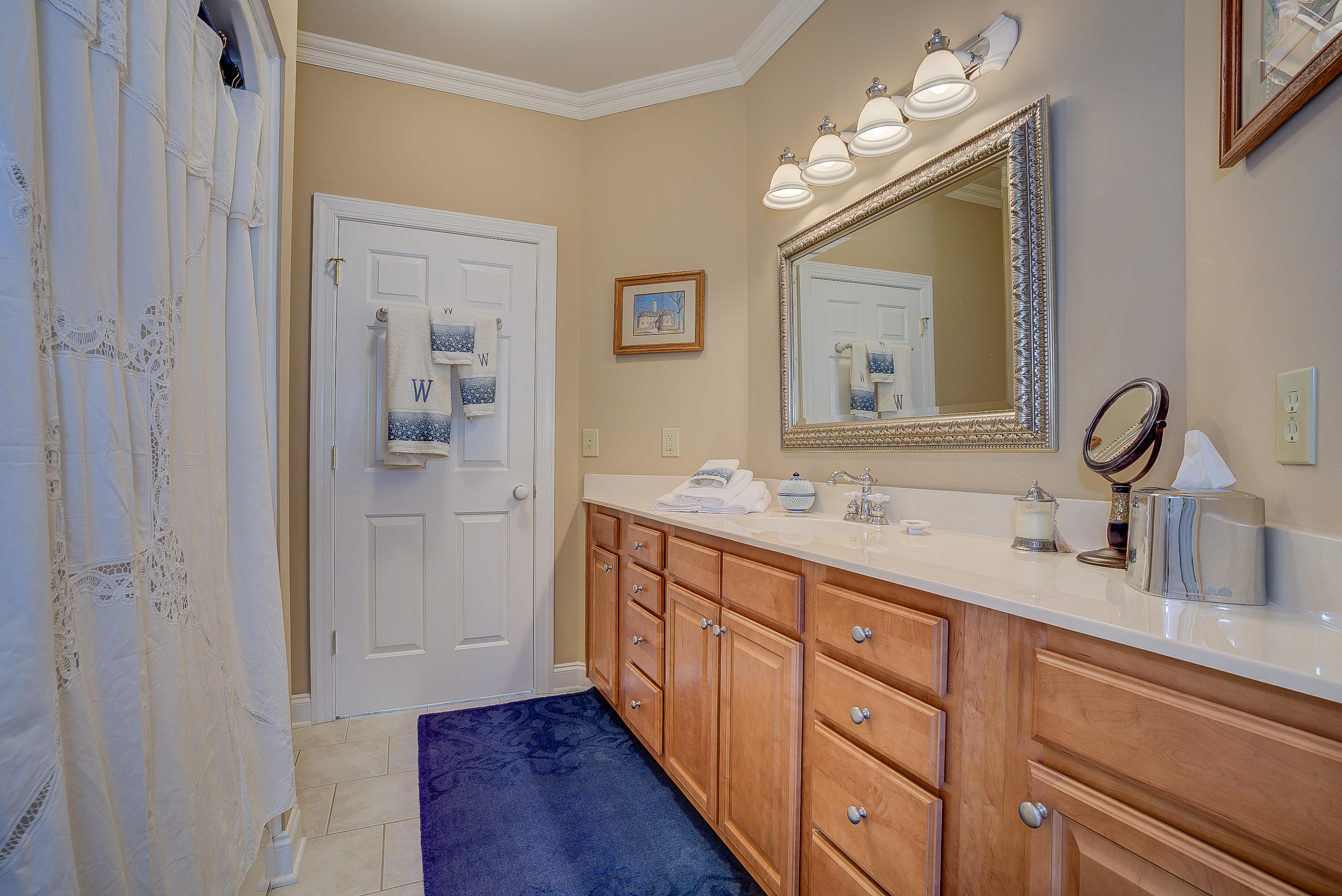 124 Massey Road Stuart, VA 24171 - Photo 33 of 42 a bathroom with a double vanity sink and a mirror
