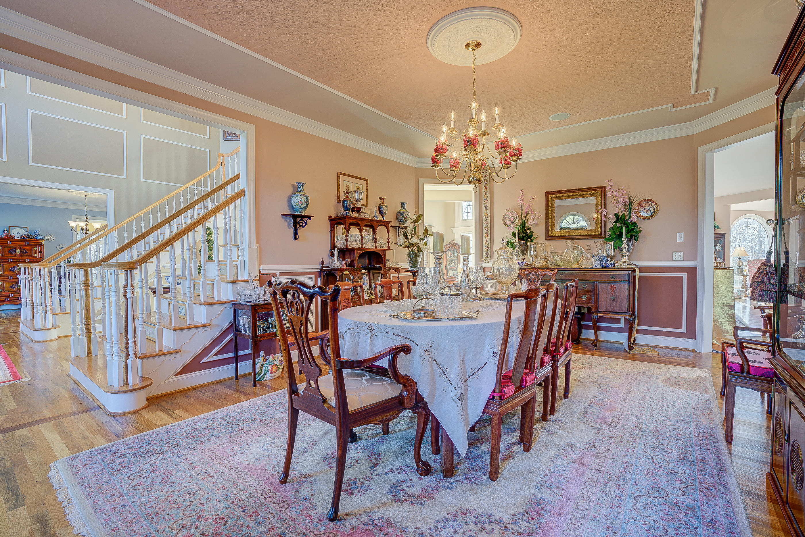 124 Massey Road Stuart, VA 24171 - Photo 9 of 42 a dining room with furniture chandelier and wooden floor