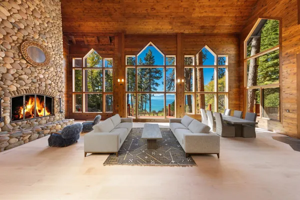 a living room with furniture fireplace and flat screen tv