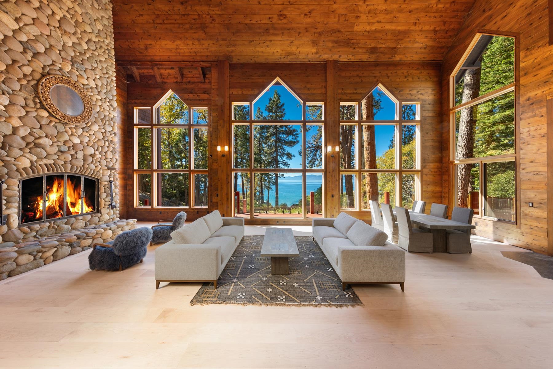 a living room with furniture fireplace and flat screen tv