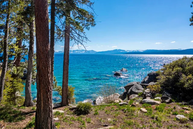 a view of a bedroom with two bed