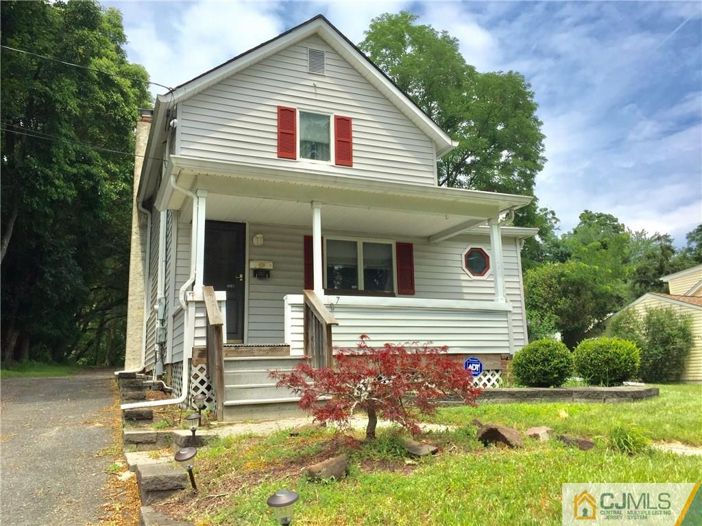 387 Middle Road Hazlet, NJ 07730 - Photo 14 of 20 front view of a house with a yard