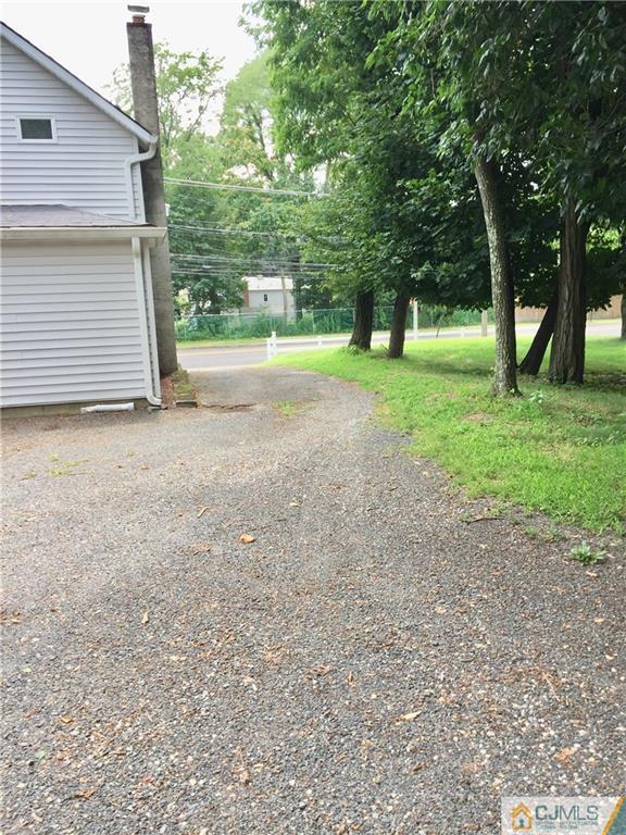 387 Middle Road Hazlet, NJ 07730 - Photo 15 of 20 a view of a yard with tree s