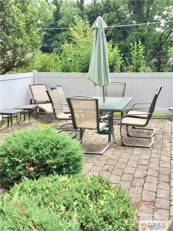 387 Middle Road Hazlet, NJ 07730 - Photo 17 of 20 a view of yard with patio and outdoor seating
