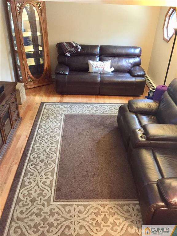 387 Middle Road Hazlet, NJ 07730 - Photo 7 of 20 a living room with furniture