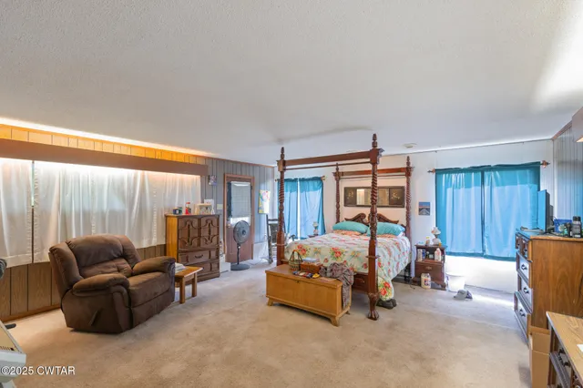 a view of a workspace with furniture and toys