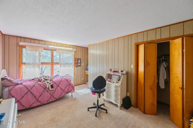 a bathroom with a sink double vanity and a mirror