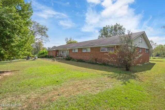 $309,000 | 10970 Sardis-Scotts Hill Road, Scotts Hill, TN 38374