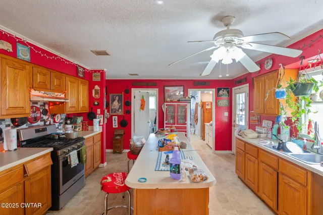 a room with furniture and chandelier