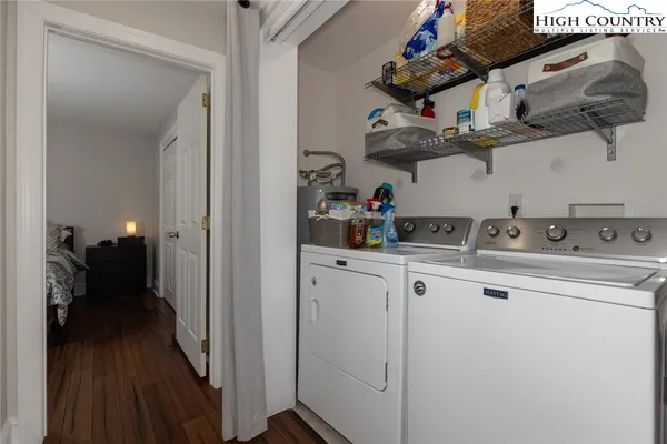 a kitchen with cabinets a sink and appliances