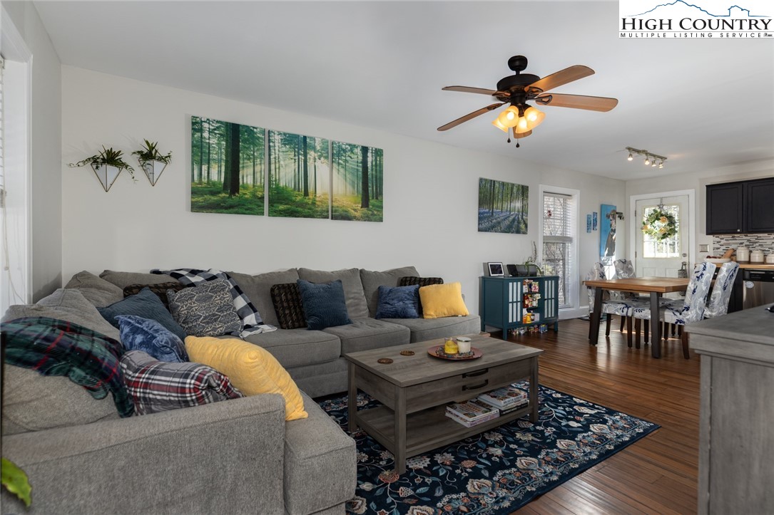 111 Peace Hill Road Fleetwood, NC 28626 - Photo 5 of 49 a living room with furniture and a rug