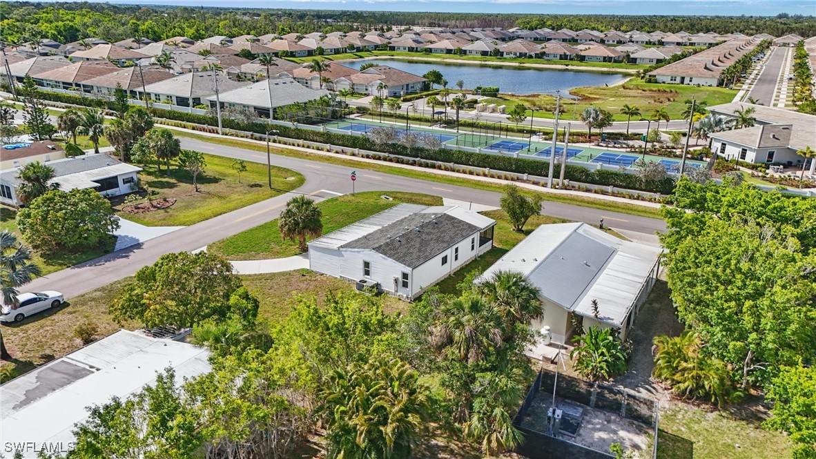 897 Manatee Road Naples, FL 34114 - Photo 35 of 36 an aerial view of a city with lawn chairs