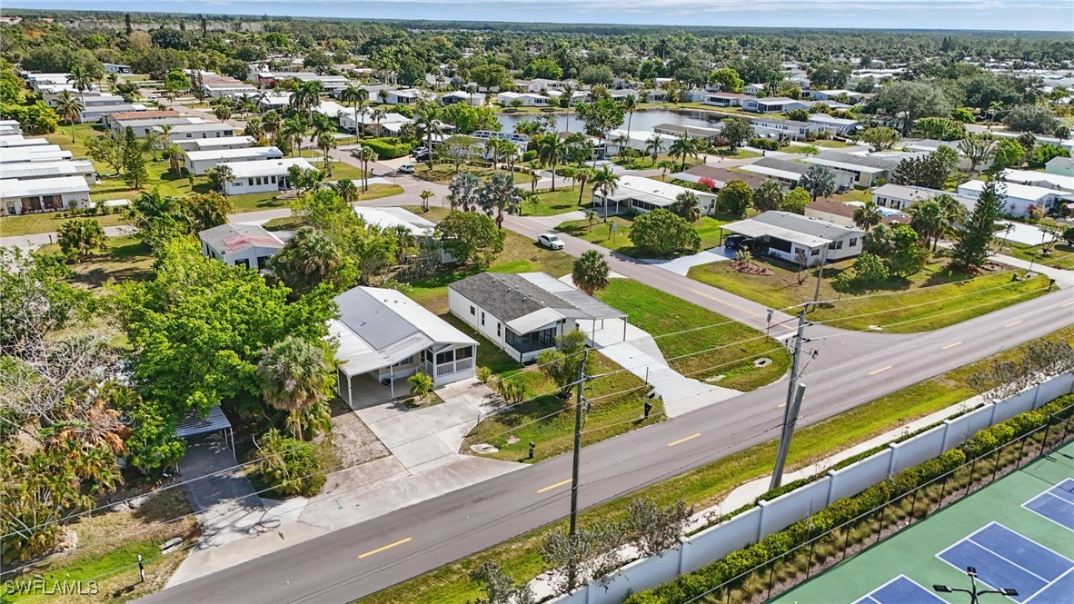 897 Manatee Road Naples, FL 34114 - Photo 36 of 36 an aerial view of residential houses with outdoor space