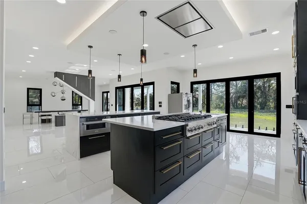 a bathroom with a shower and mirror