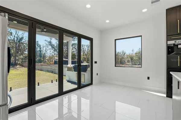a bedroom with a bed and a view of bathroom