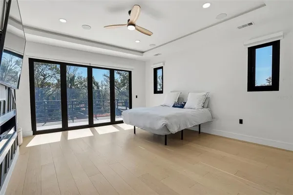 a view of a livingroom with an empty space and a flat screen tv