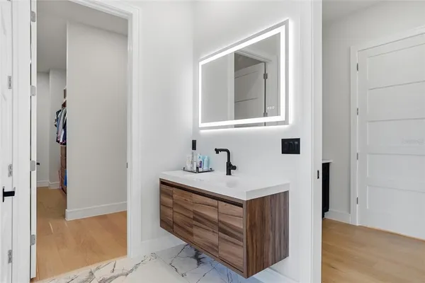 a bathroom with a shower and toilet