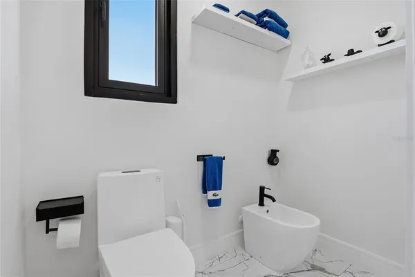 a view of a patio with a backyard