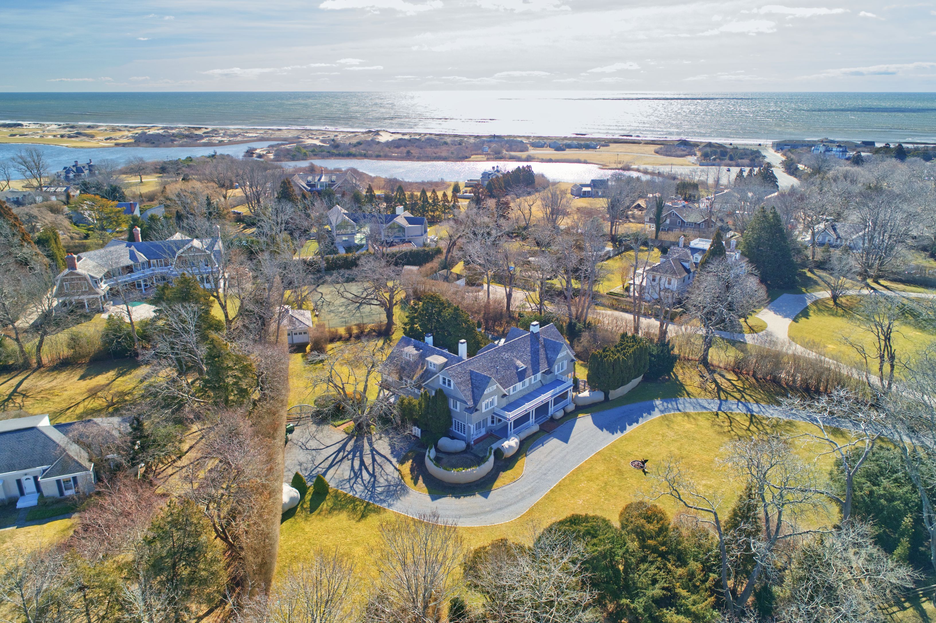 61 Ocean Avenue East Hampton, NY 11937 - Photo 1 of 23 a view of a city with an ocean