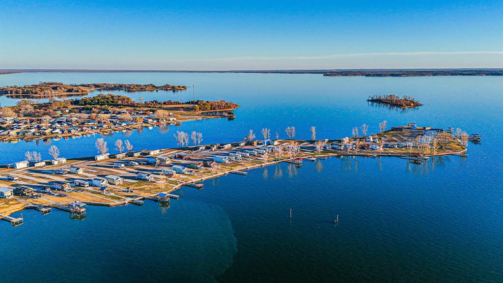 6422 Peninsula Road Kerens, TX 75144 - Photo 15 of 16 a ocean view with boat and palm trees