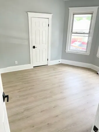 an empty room with window