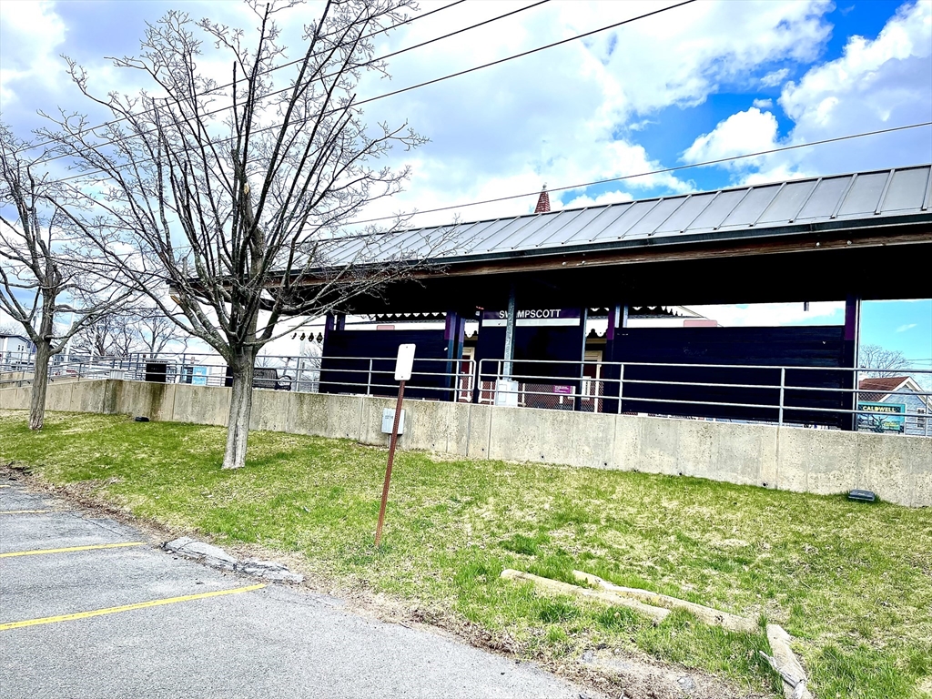 38 Oneida Street, Unit 2 Lynn, MA 01902 - Photo 21 of 22 a view of a backyard with a garden