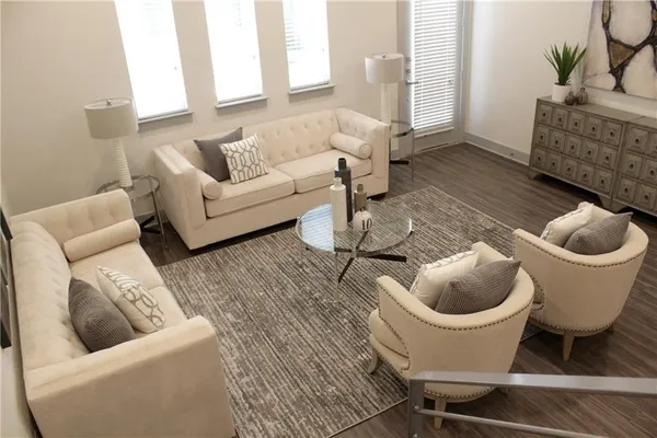 a living room with furniture and a couch