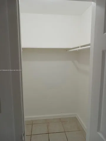 a view of small space with racks on the wall