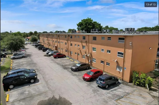 a view of a street with cars park