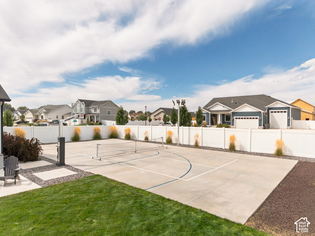 259 South Chamberlain Street Mapleton, UT 84664 - Photo 8 of 54 Expansive concrete court with painted lines and a net, surrounded by a white privacy fence