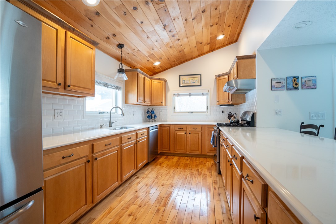 595 Lake Road Webster, NY 14580 - Photo 15 of 49 Hard maple cabinetry, expansive quartz counter top
