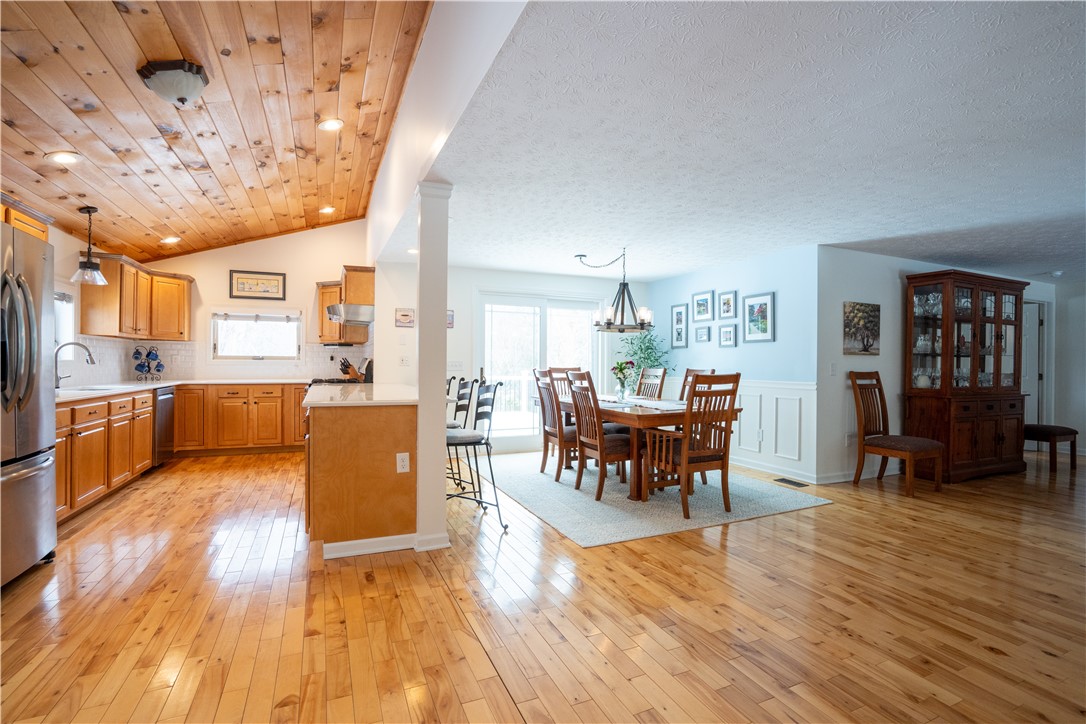 595 Lake Road Webster, NY 14580 - Photo 16 of 49 Kitchen/dining area joined by a large breakfast ba