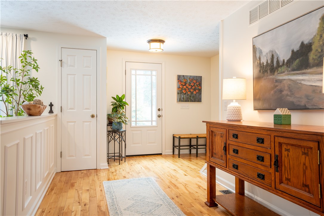 595 Lake Road Webster, NY 14580 - Photo 20 of 49 Front door of the house faces Lake Road, coat clos