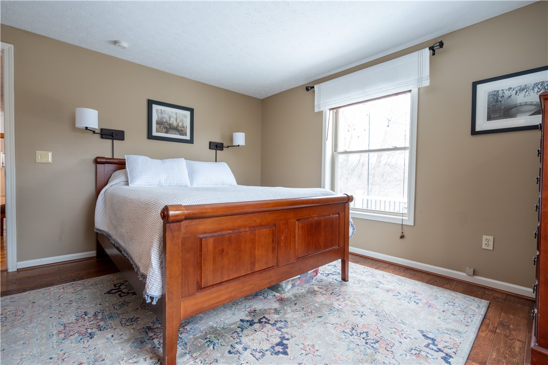 595 Lake Road Webster, NY 14580 - Photo 27 of 49 First floor primary bedroom