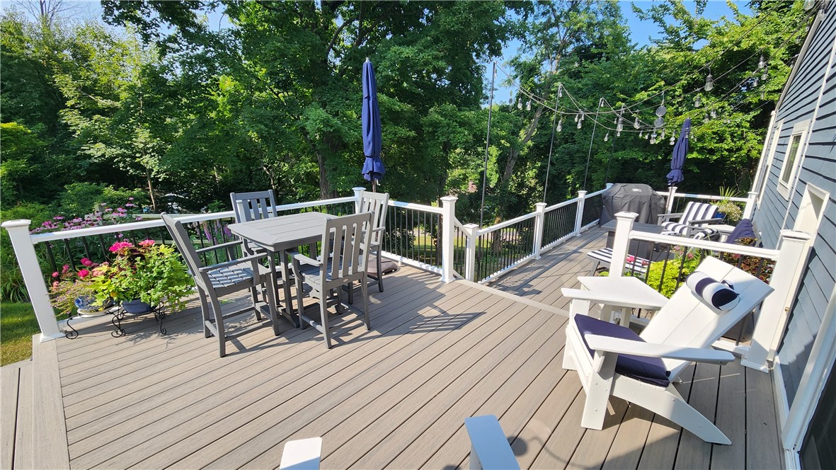 595 Lake Road Webster, NY 14580 - Photo 3 of 49 Summer view of new composite deck - ready for spri