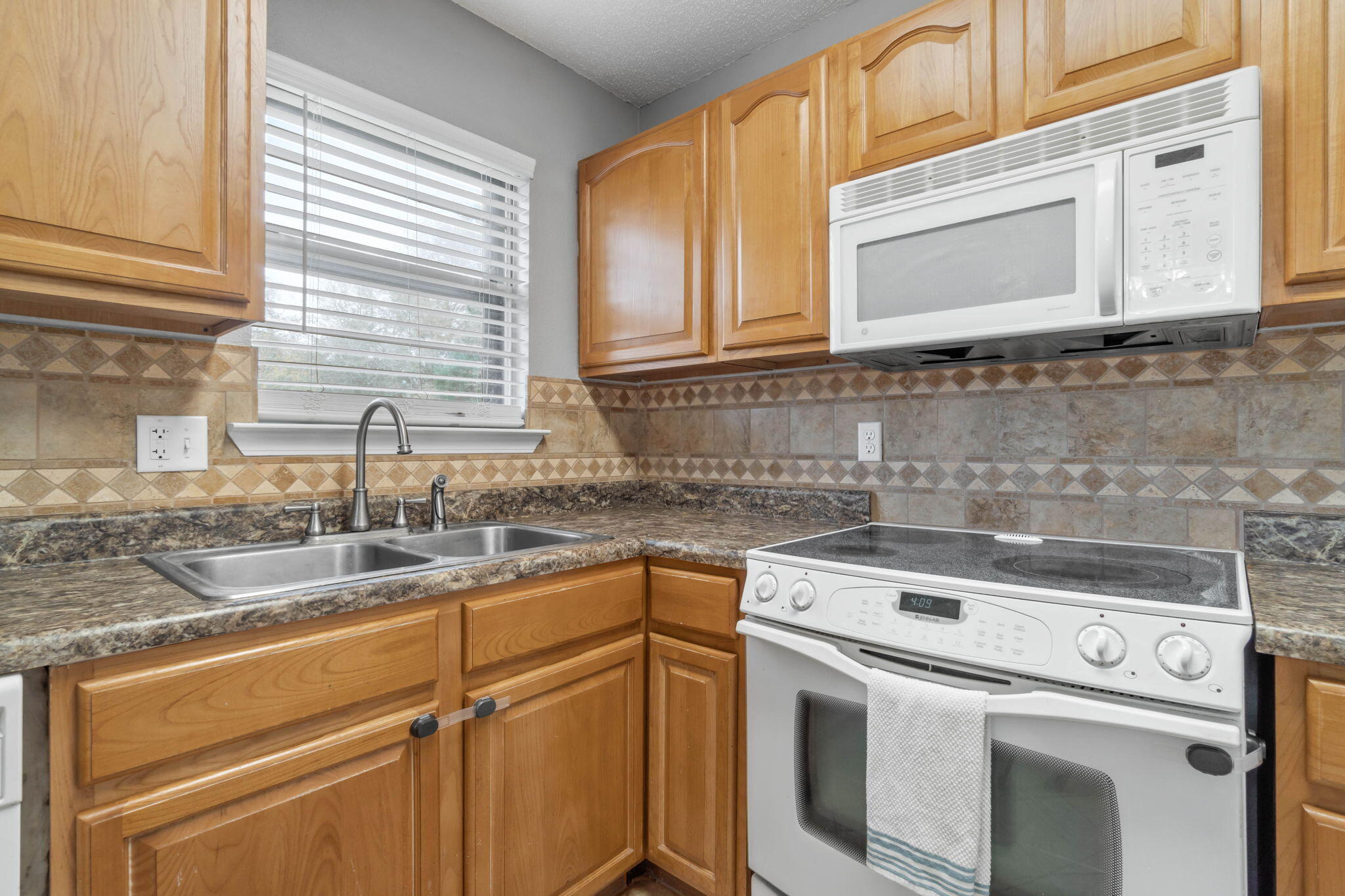 3545 Poverty Creek Road Crestview, FL 32539 - Photo 17 of 33 a view of a kitchen with sink and cabinets
