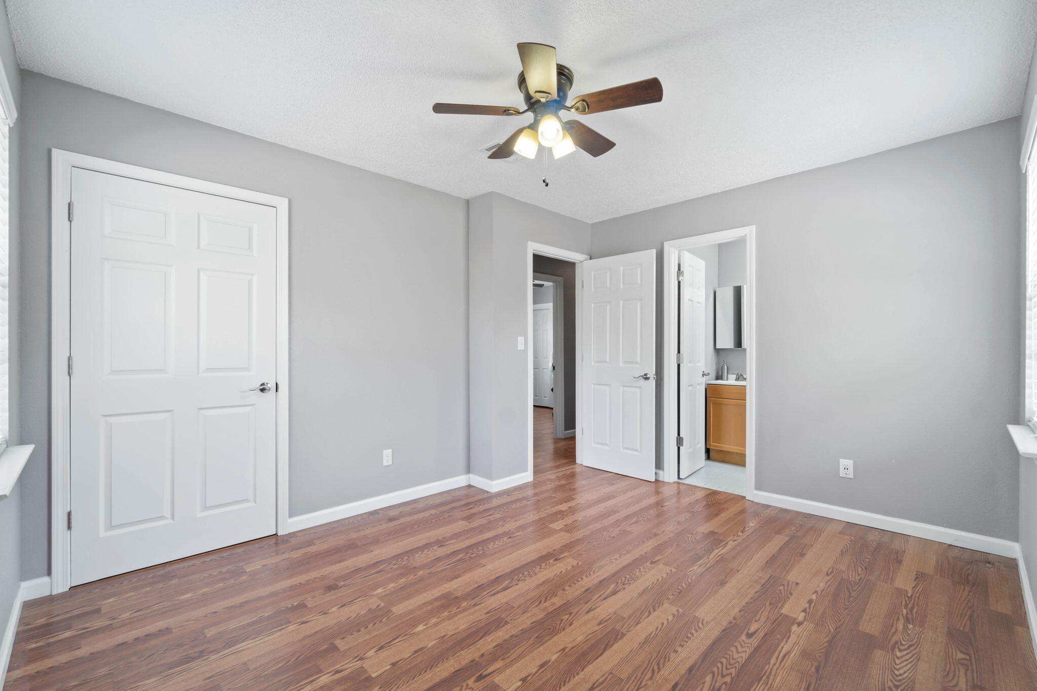 3545 Poverty Creek Road Crestview, FL 32539 - Photo 20 of 33 a view of an empty room with wooden floor