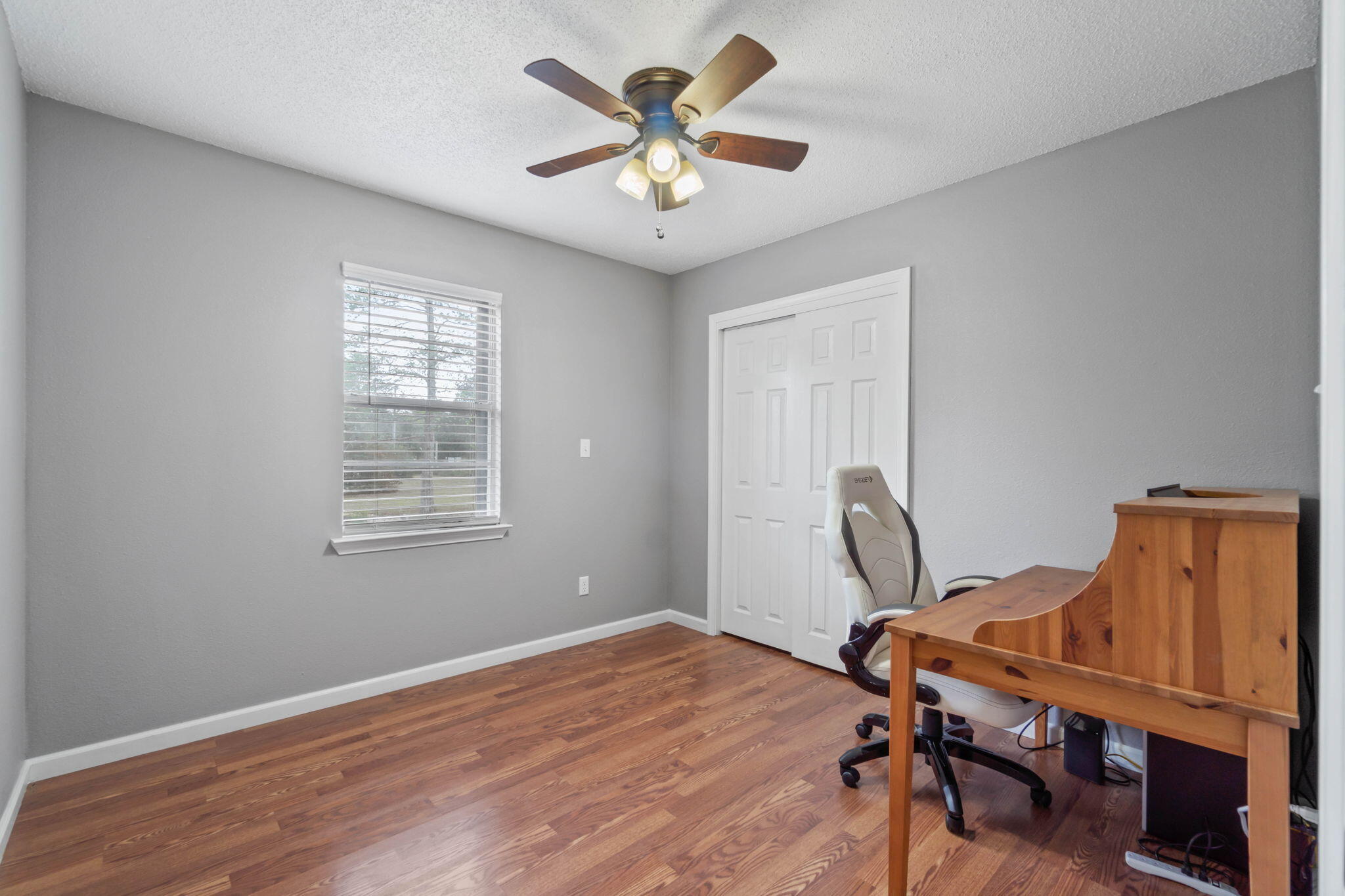 3545 Poverty Creek Road Crestview, FL 32539 - Photo 25 of 33 a workspace with chandelier