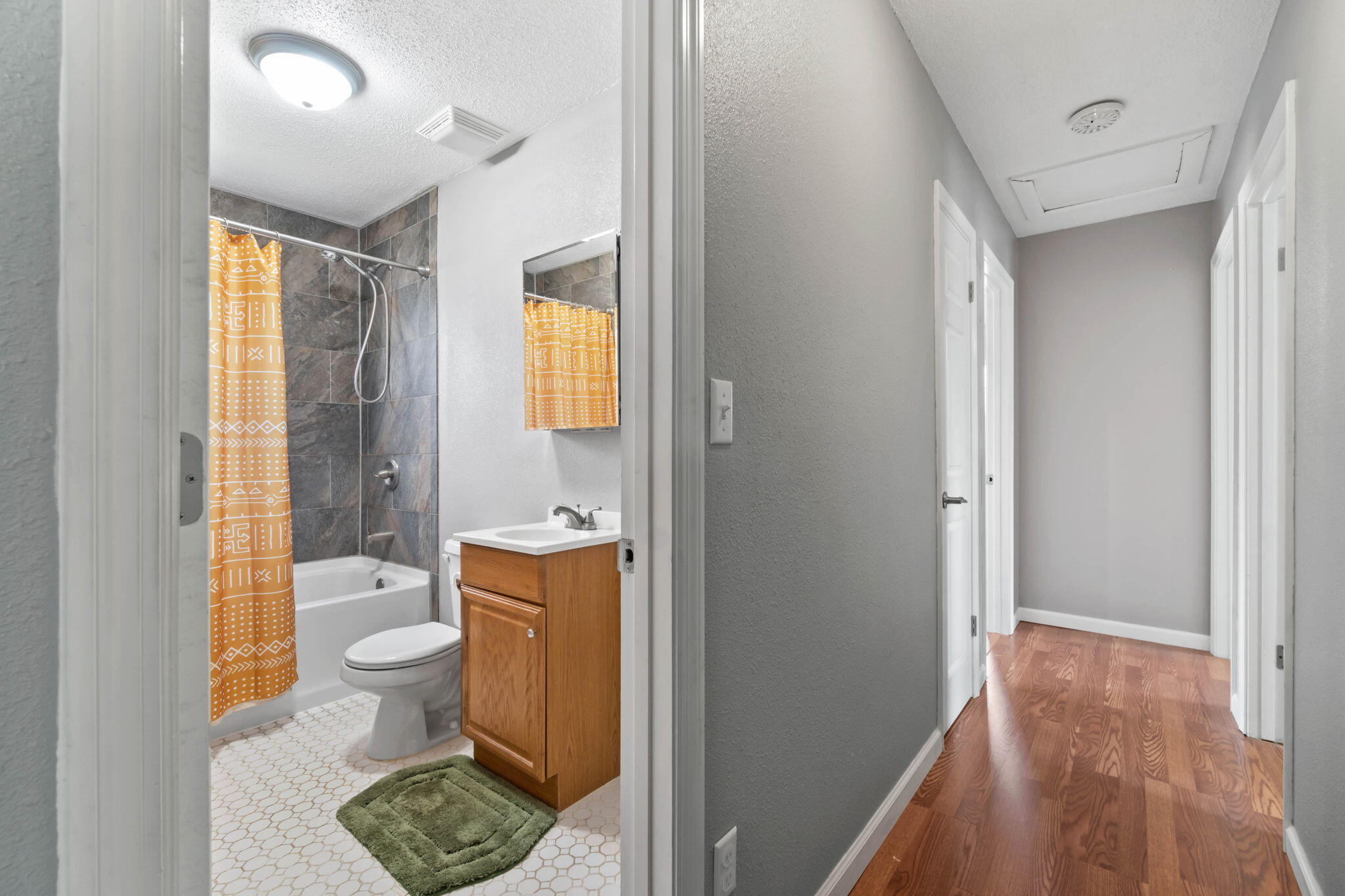 3545 Poverty Creek Road Crestview, FL 32539 - Photo 27 of 33 a bathroom with a granite countertop sink a toilet and shower