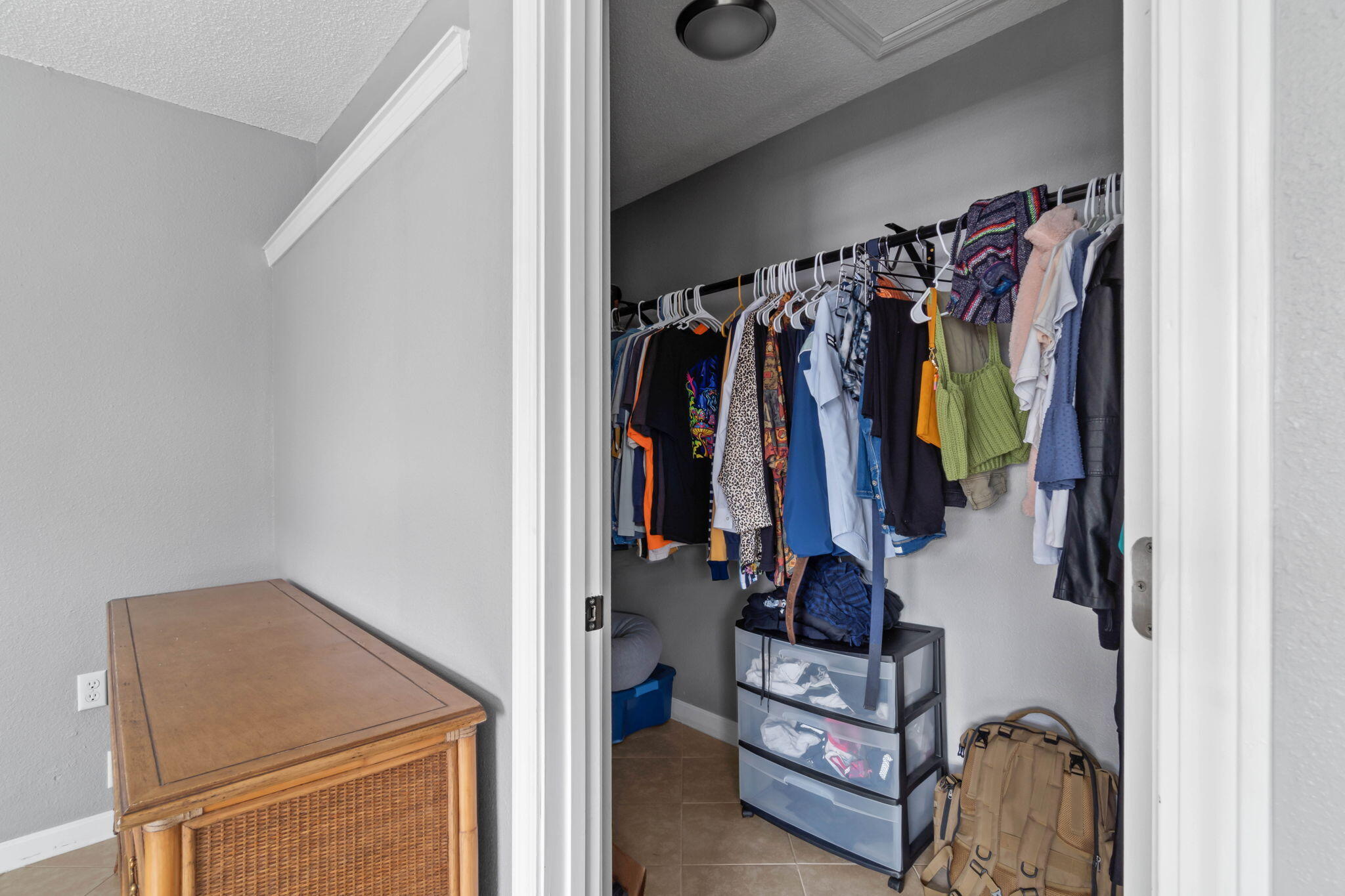 3545 Poverty Creek Road Crestview, FL 32539 - Photo 31 of 33 a view of walk in closet with clothes and shoes