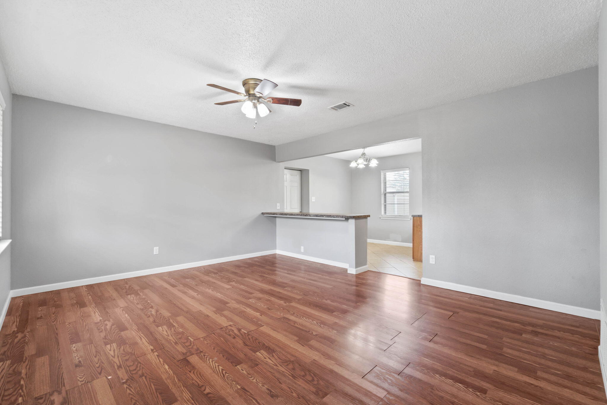 3545 Poverty Creek Road Crestview, FL 32539 - Photo 10 of 33 a view of empty room with wooden floor