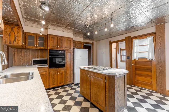 a bathroom with a sink and a shower