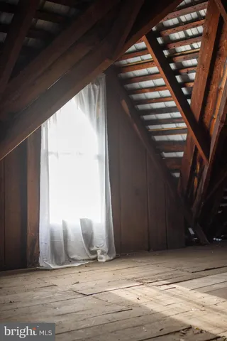 a view of a garden with a house