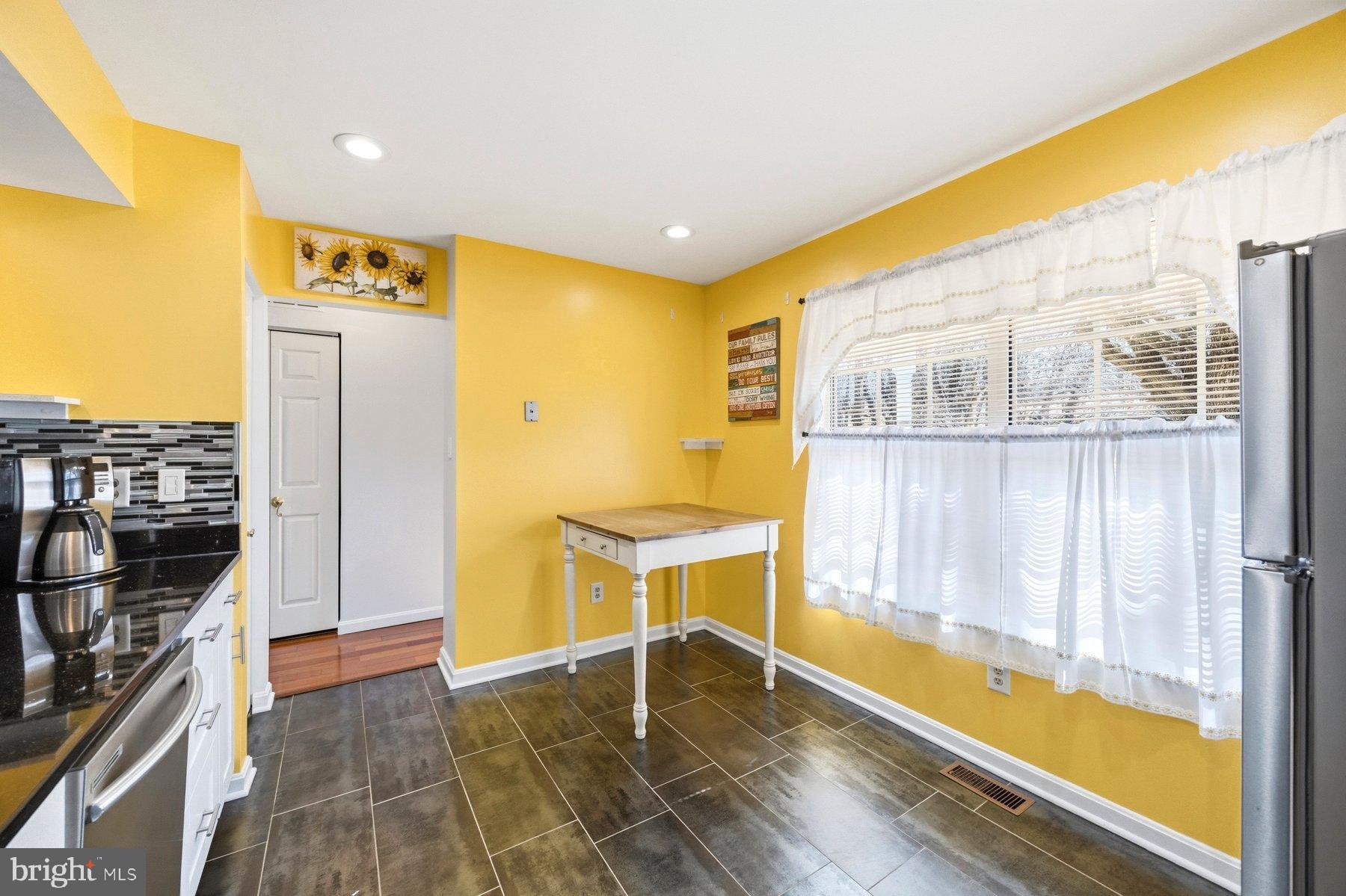 58 Hardwood Drive Rosedale, MD 21237 - Photo 11 of 38 Bright and cheerful kitchen with sunny vibes.