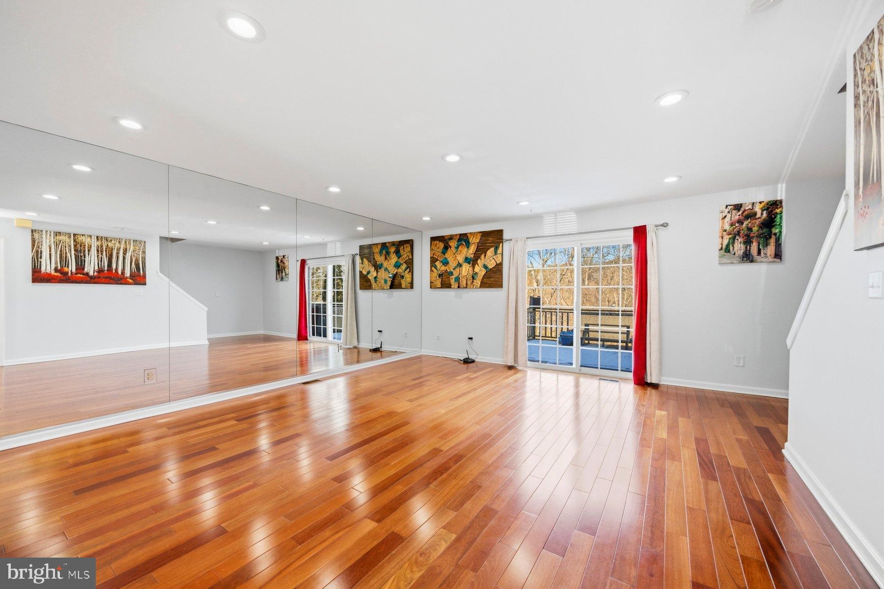 58 Hardwood Drive Rosedale, MD 21237 - Photo 12 of 38 Spacious room with mirrored walls and light.